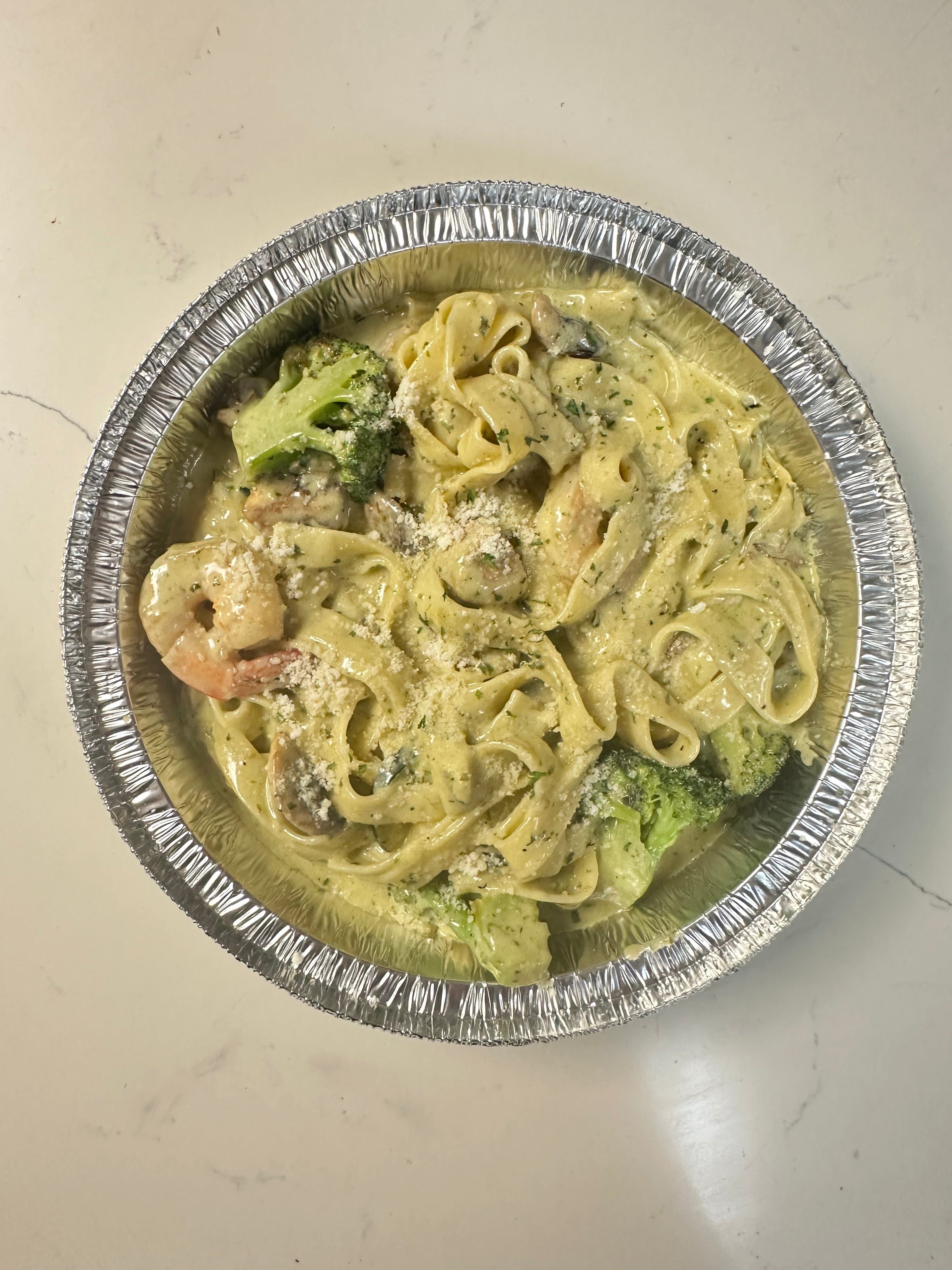 Shrimp Alfredo With With zucchini, broccoli, and fresh mushrooms.