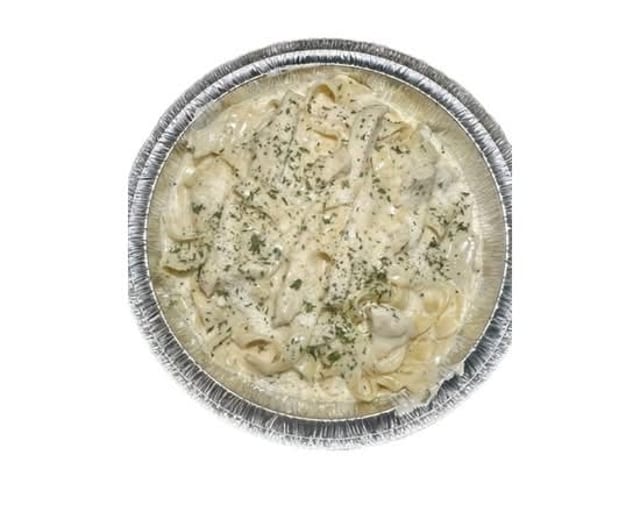 Chicken Alfredo With zucchini, broccoli, and mushrooms.